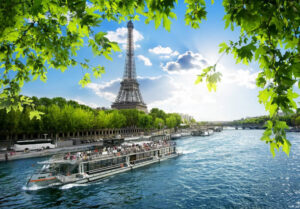Boat trip on Seine with the view on Eiffel Tower in Paris, France